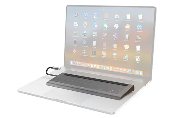 USB-C docking station is connected to the laptop.